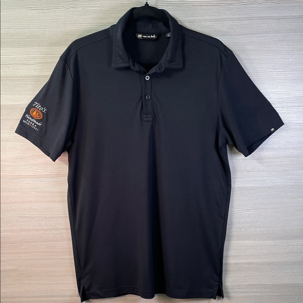 Travis Mathew Black Polo Activewear Shirt with Tito’s Vodka Embroidery Medium